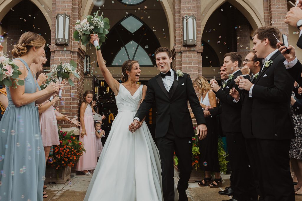 15 ways to save money on your wedding, church exit at wedding, bubble exit