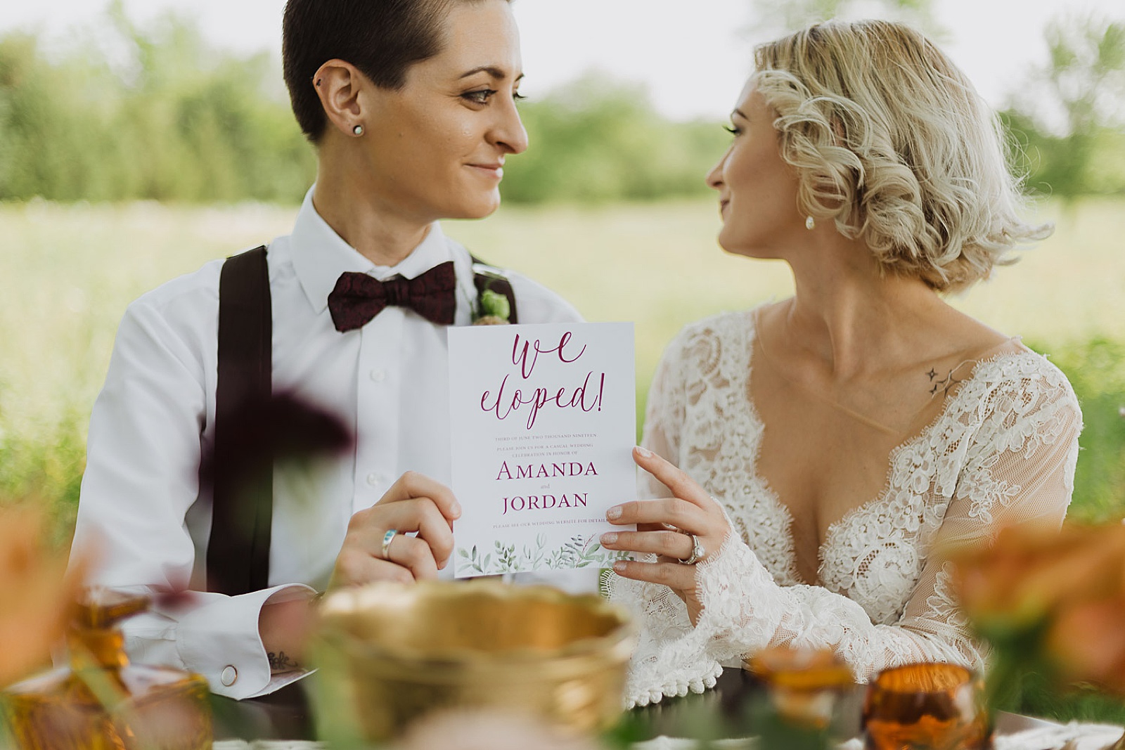 Couple Holding Invitation Boho Kansas City Styled Elopement captured by Caitlyn Cloud Photography