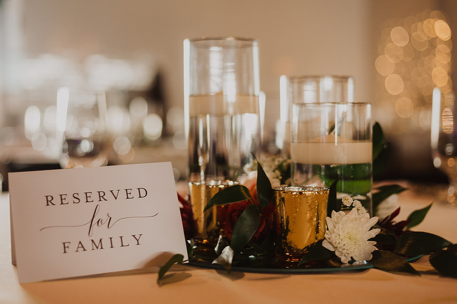 Reception details burgundy and greenery from Kansas City Wedding at The Guild Photographed by Caitlyn Cloud Photography