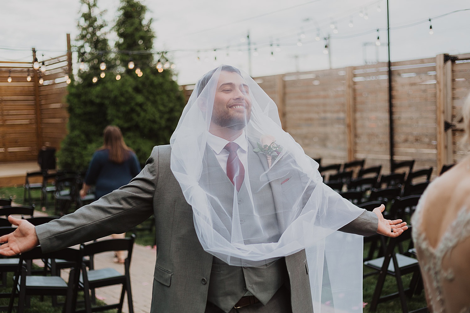 groom under veil from Kansas City Wedding at The Guild Photographed by Caitlyn Cloud Photography