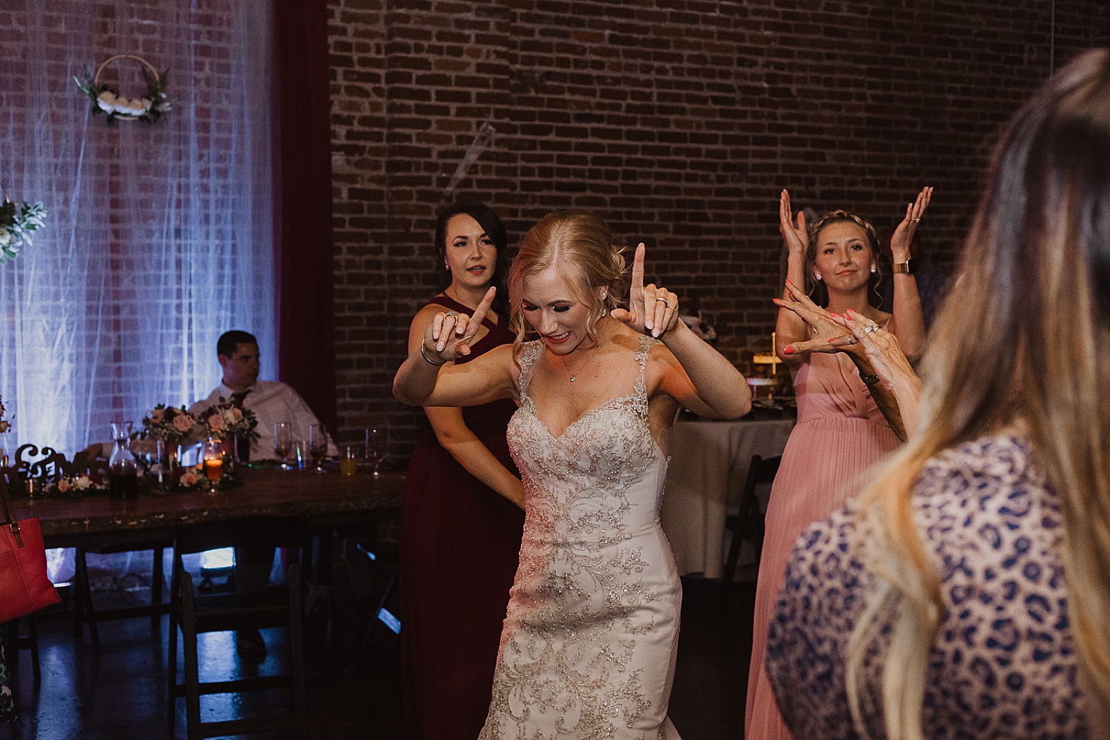 Reception guests dancing from Kansas City Wedding at The Guild Photographed by Caitlyn Cloud Photography