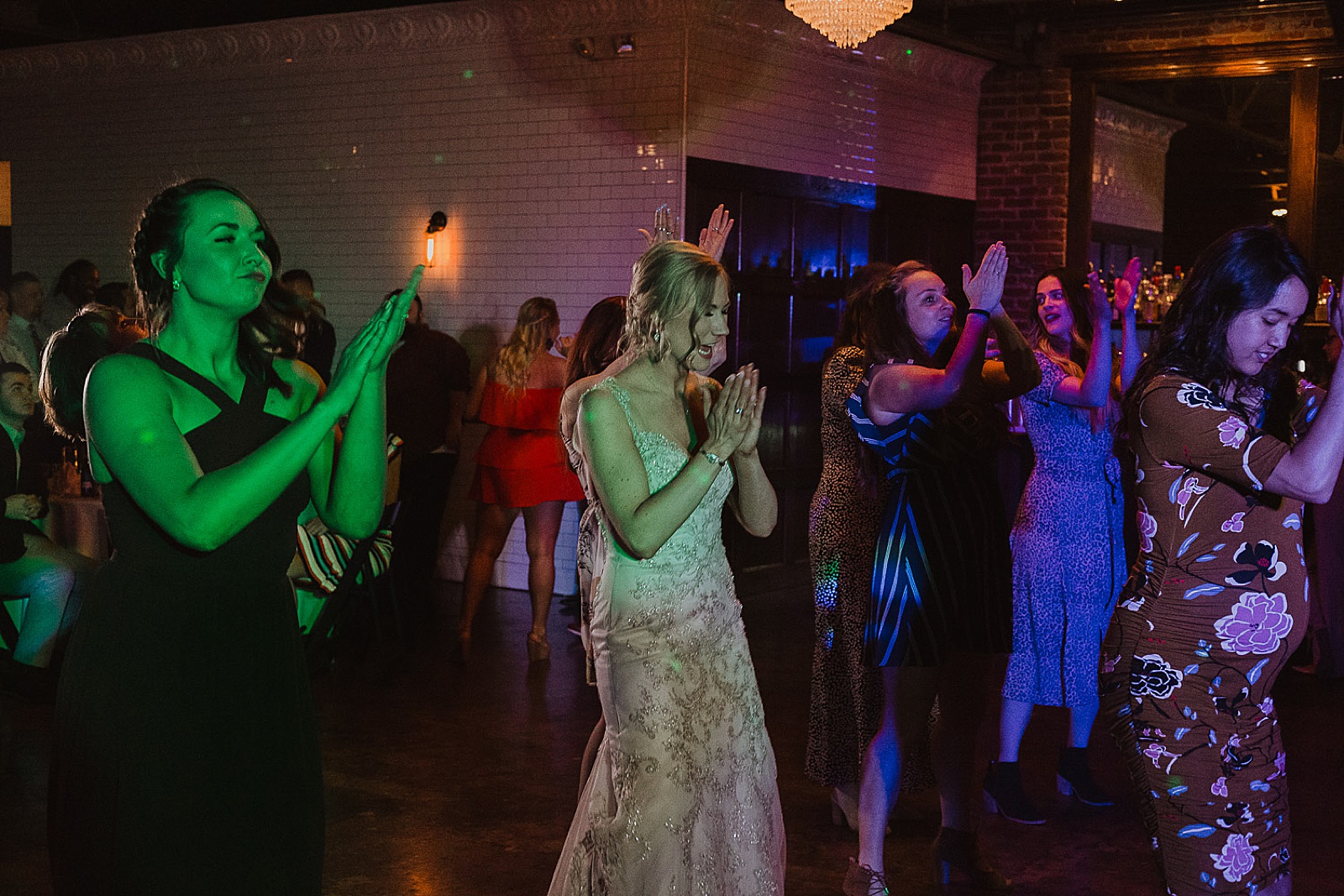 Reception guests dancing from Kansas City Wedding at The Guild Photographed by Caitlyn Cloud Photography