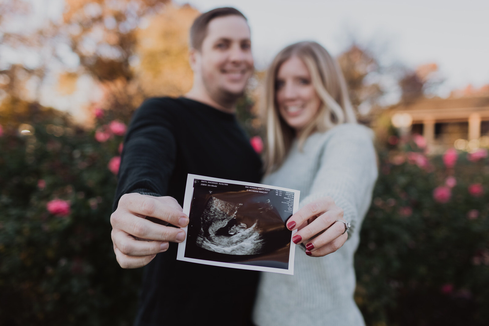 Pregnancy Announcement photos at Loose Park in Kansas City