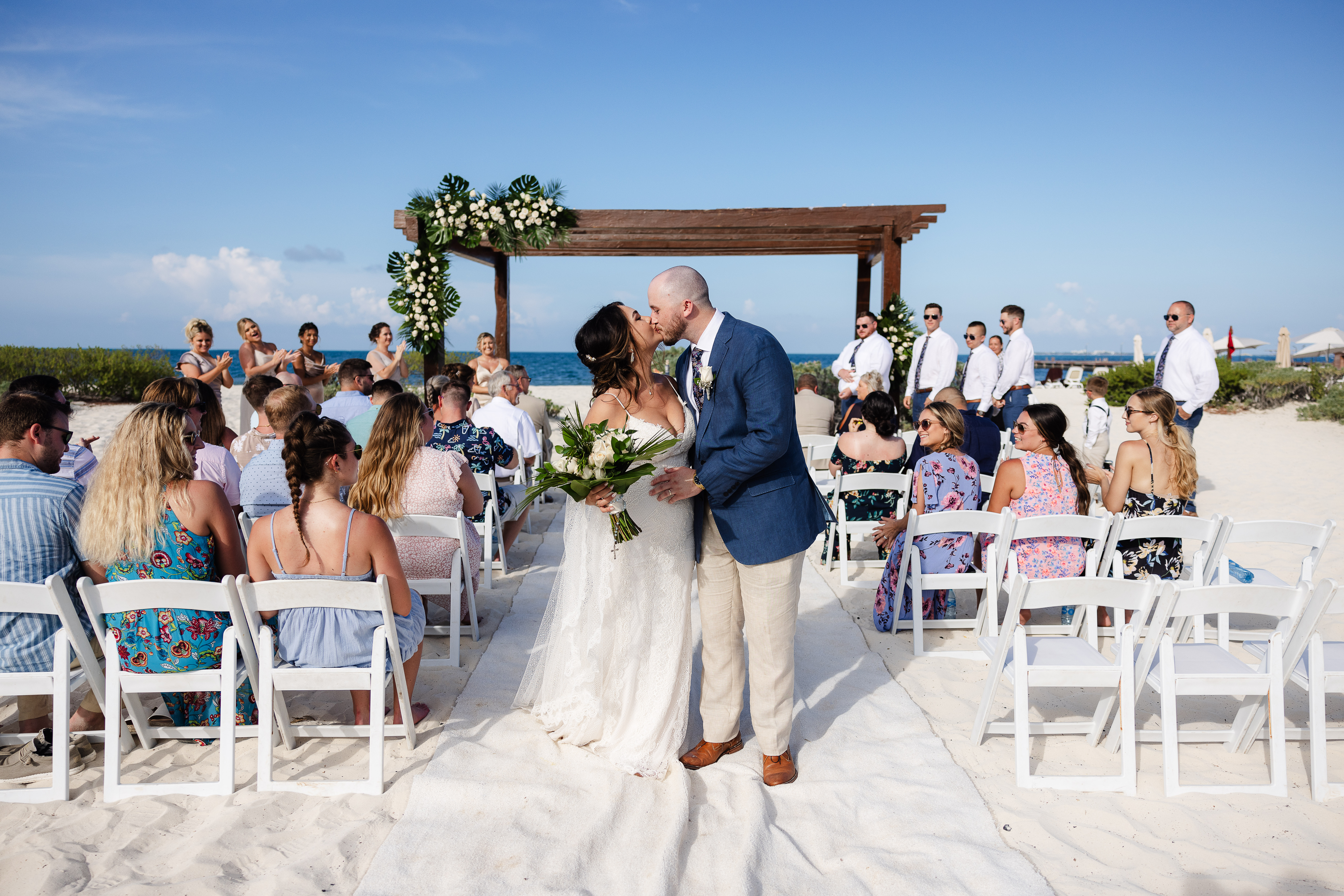 Destination Wedding in Mexico. Couple kissing after ceremony